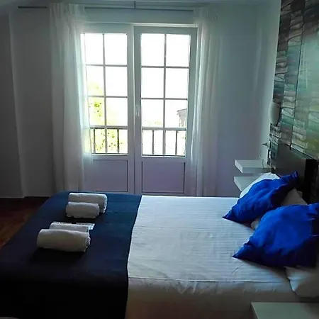 Hotell Playa De Quenxe